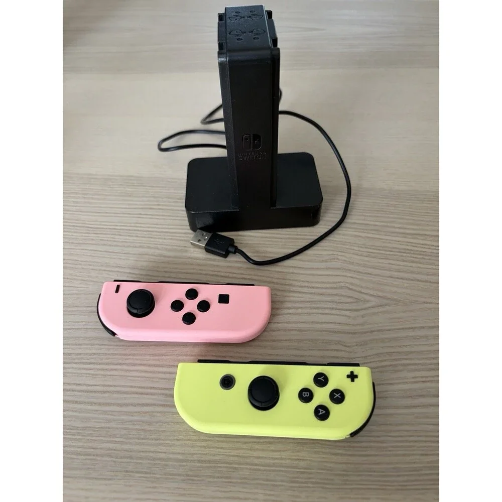 Nintendo Switch Joy-Con Controllers Neon Pink Yellow Charging Dock Wrist Straps